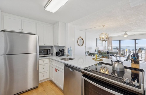 Avon By The Sea Condo | Penthouse next to the Pier. Direct ocean view. Heated pool and BBQ grills! 🌞🌴