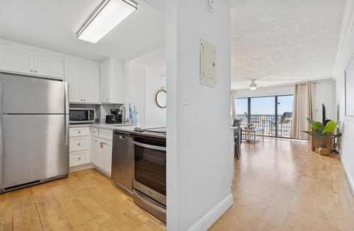 Avon By The Sea Condo | Penthouse next to the Pier. Direct ocean view. Heated pool and BBQ grills! 🌞🌴