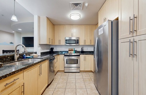 Sandbridge Condo | Renovated condo with ocean and back bay views, central AC, & pools
