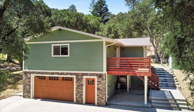 Nestled in acres of forest and walkable to town